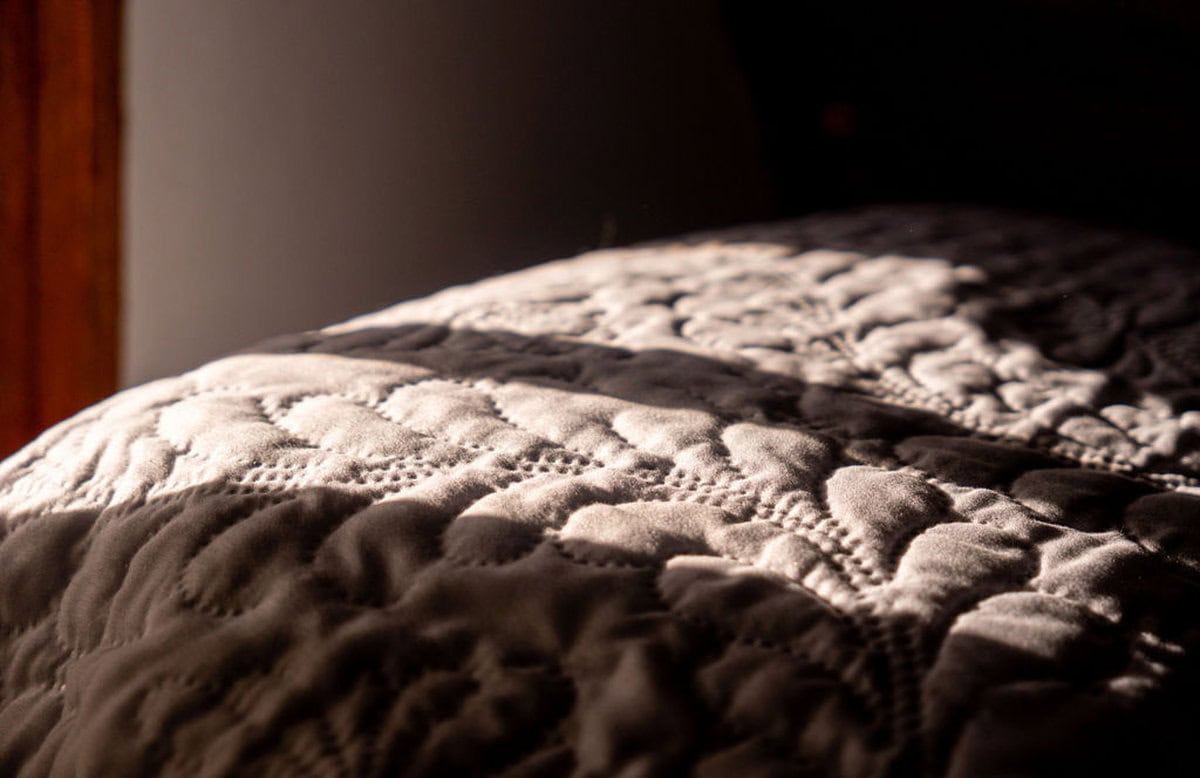 Rustic stone terrace with panoramic Guatape lake views at Finca Conejo Blanco vacation rental