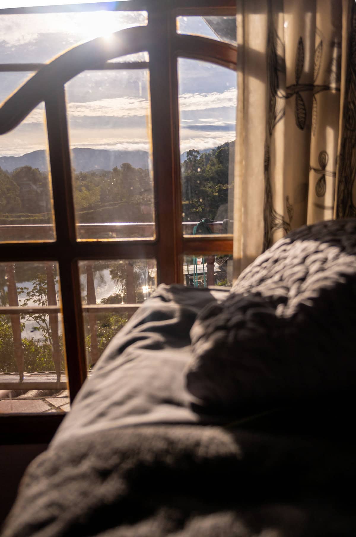 Traditional Colombian finca architecture with mountain backdrop in Guatape Antioquia