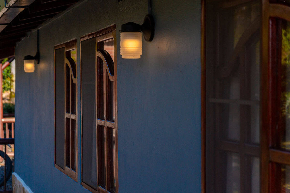 Spacious living room with fireplace at Finca Conejo Blanco countryside estate