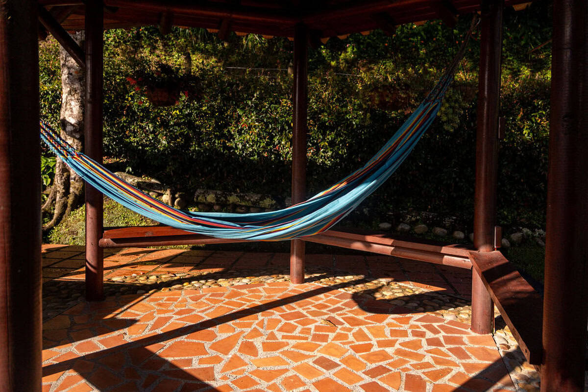 Modern kitchen with mountain-view windows at Finca Conejo Blanco luxury rental