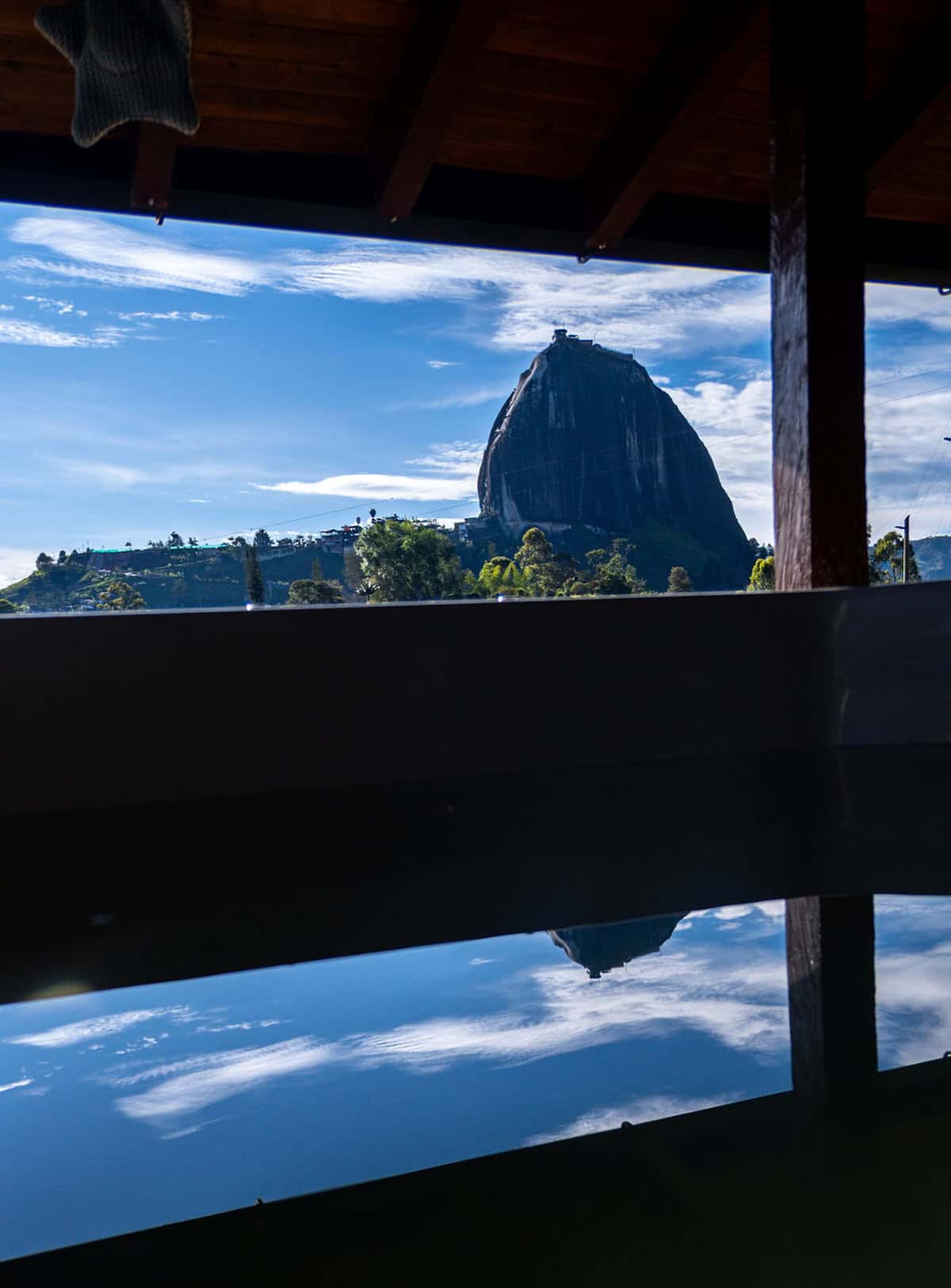 Spacious living room with fireplace at Finca Conejo Blanco countryside estate