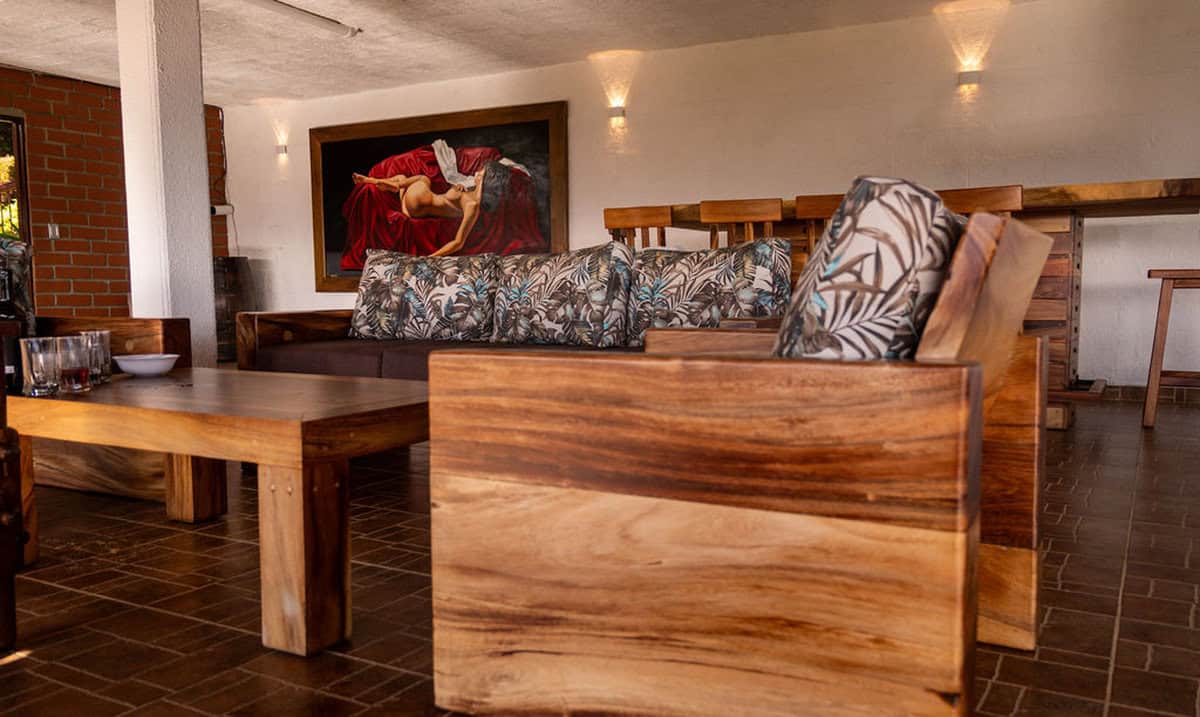 Traditional Colombian finca architecture with mountain backdrop in Guatape Antioquia