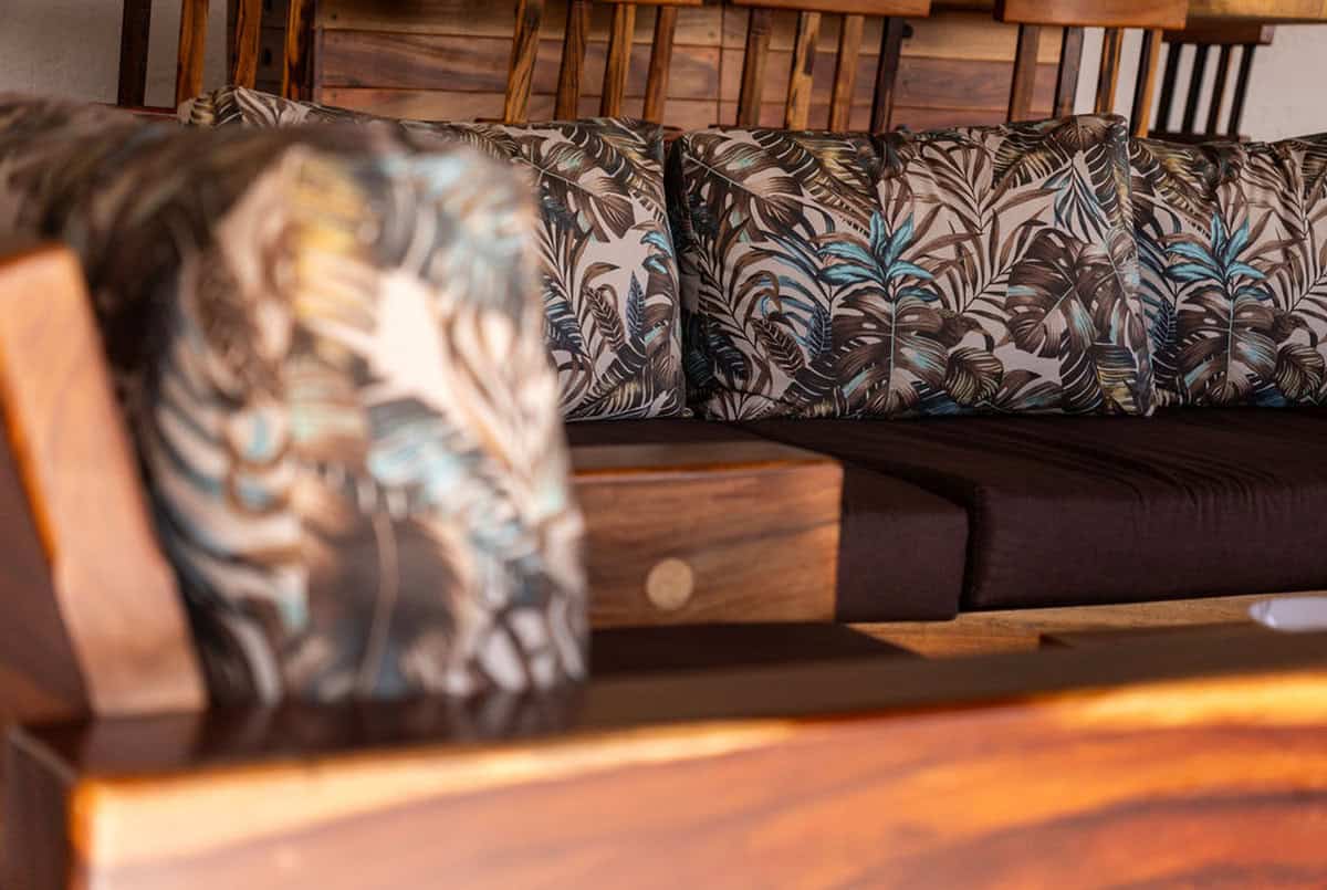 Wooden balcony with views of Guatape Rock at boutique vacation rental