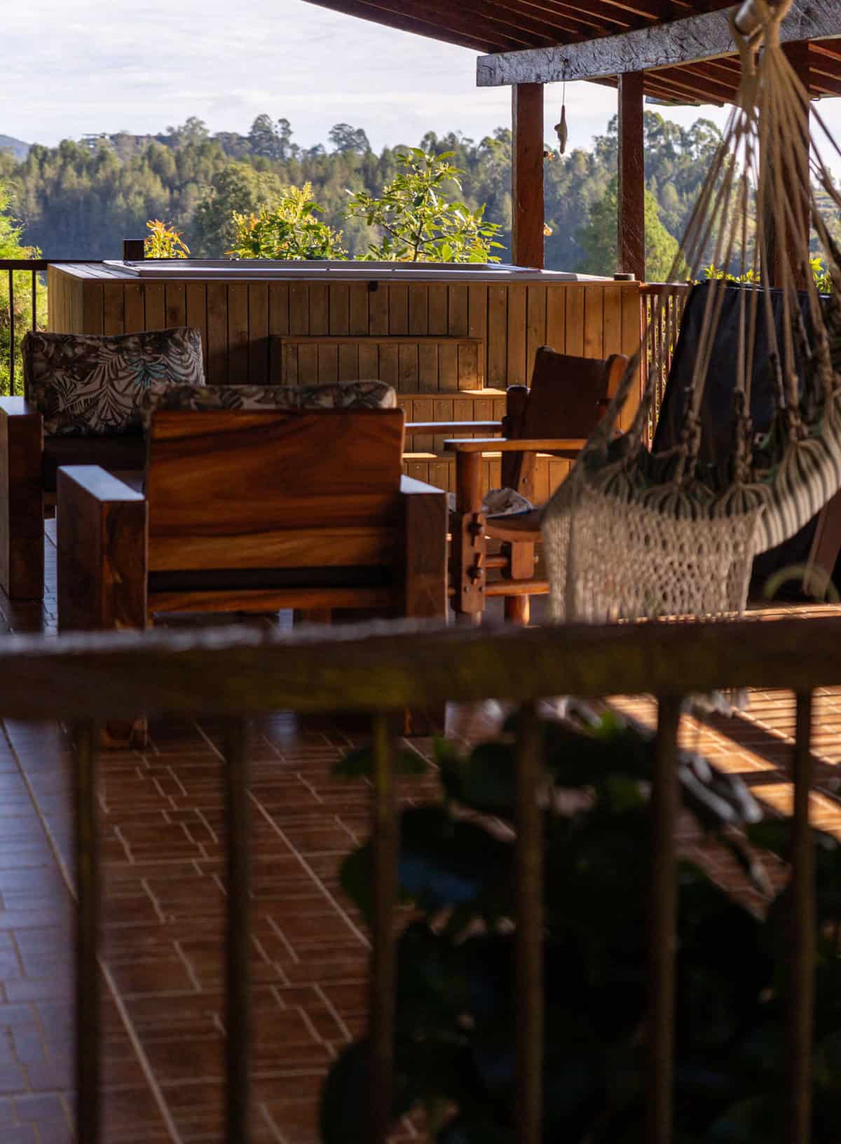 Rustic stone terrace with panoramic Guatape lake views at Finca Conejo Blanco vacation rental