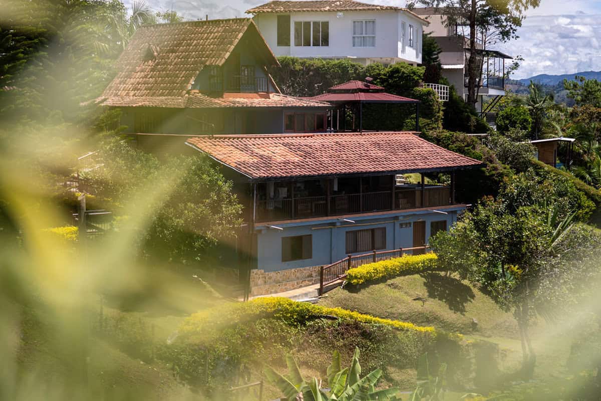 Morning mist over Guatape reservoir from countryside finca viewpoint