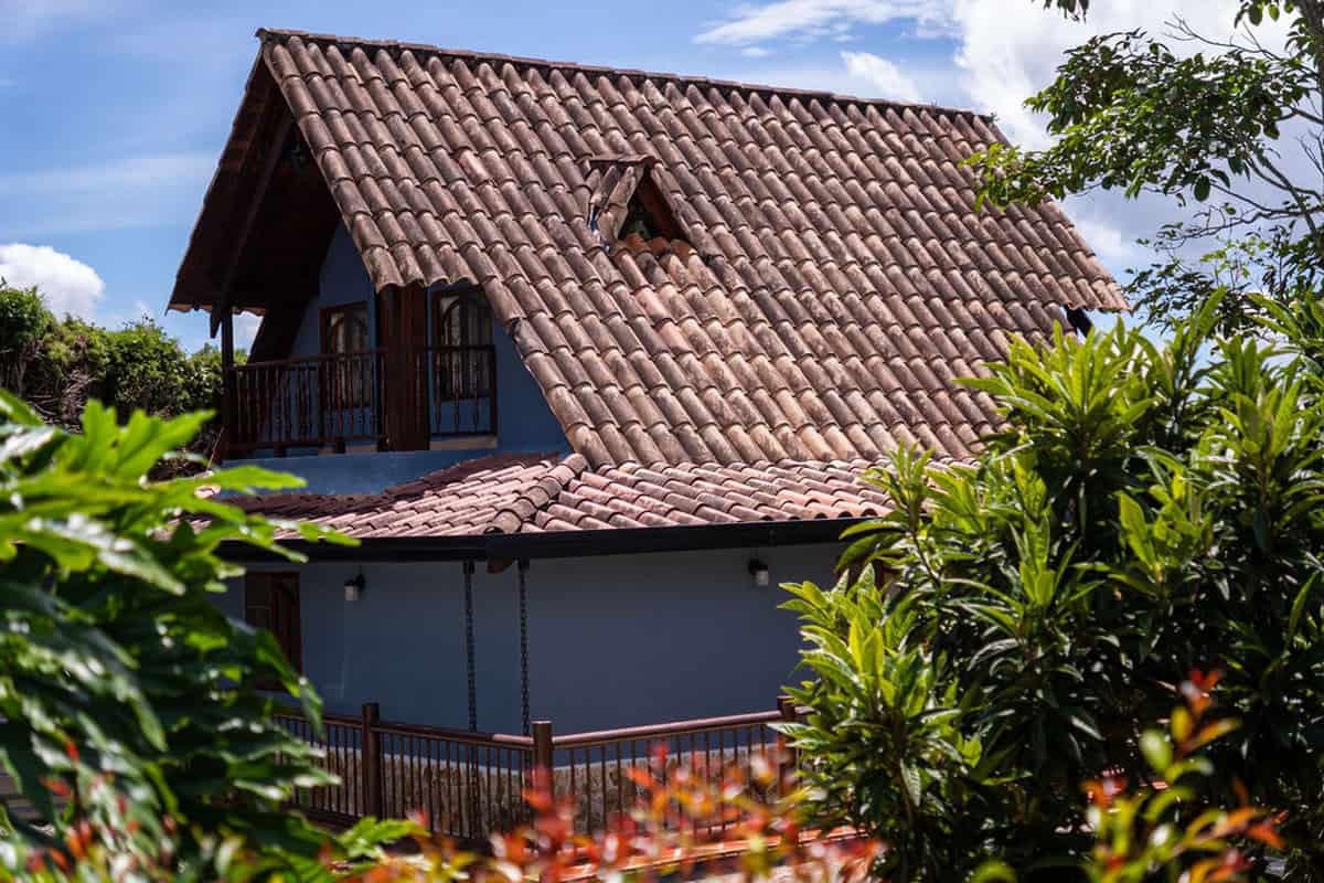 Rustic stone terrace with panoramic Guatape lake views at Finca Conejo Blanco vacation rental