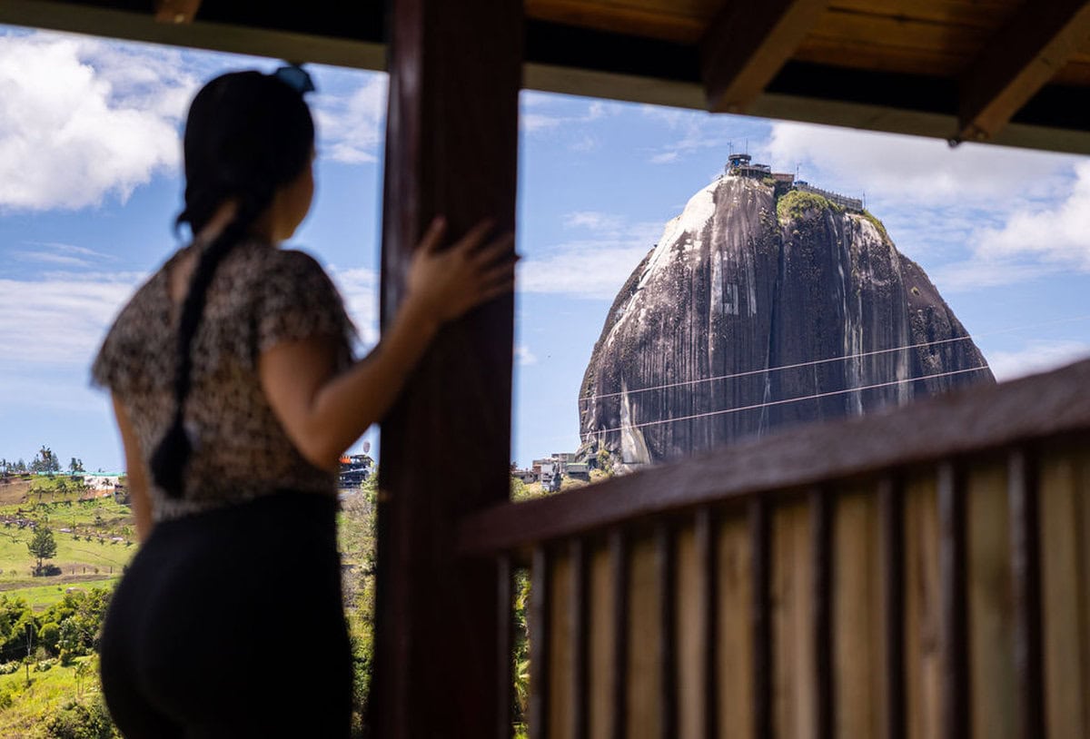 Modern kitchen with mountain-view windows at Finca Conejo Blanco luxury rental