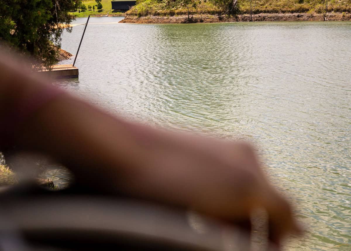 Wooden balcony with views of Guatape Rock at boutique vacation rental