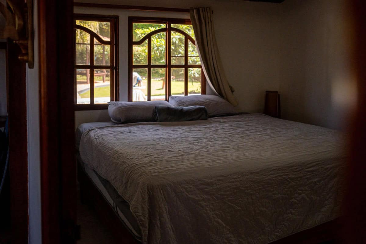 Morning mist over Guatape reservoir from countryside finca viewpoint