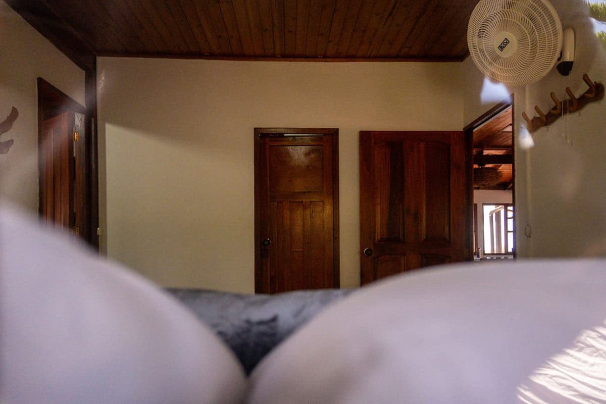 Private outdoor jacuzzi with panoramic views of Guatape Rock at Finca Conejo Blanco luxury vacation rental