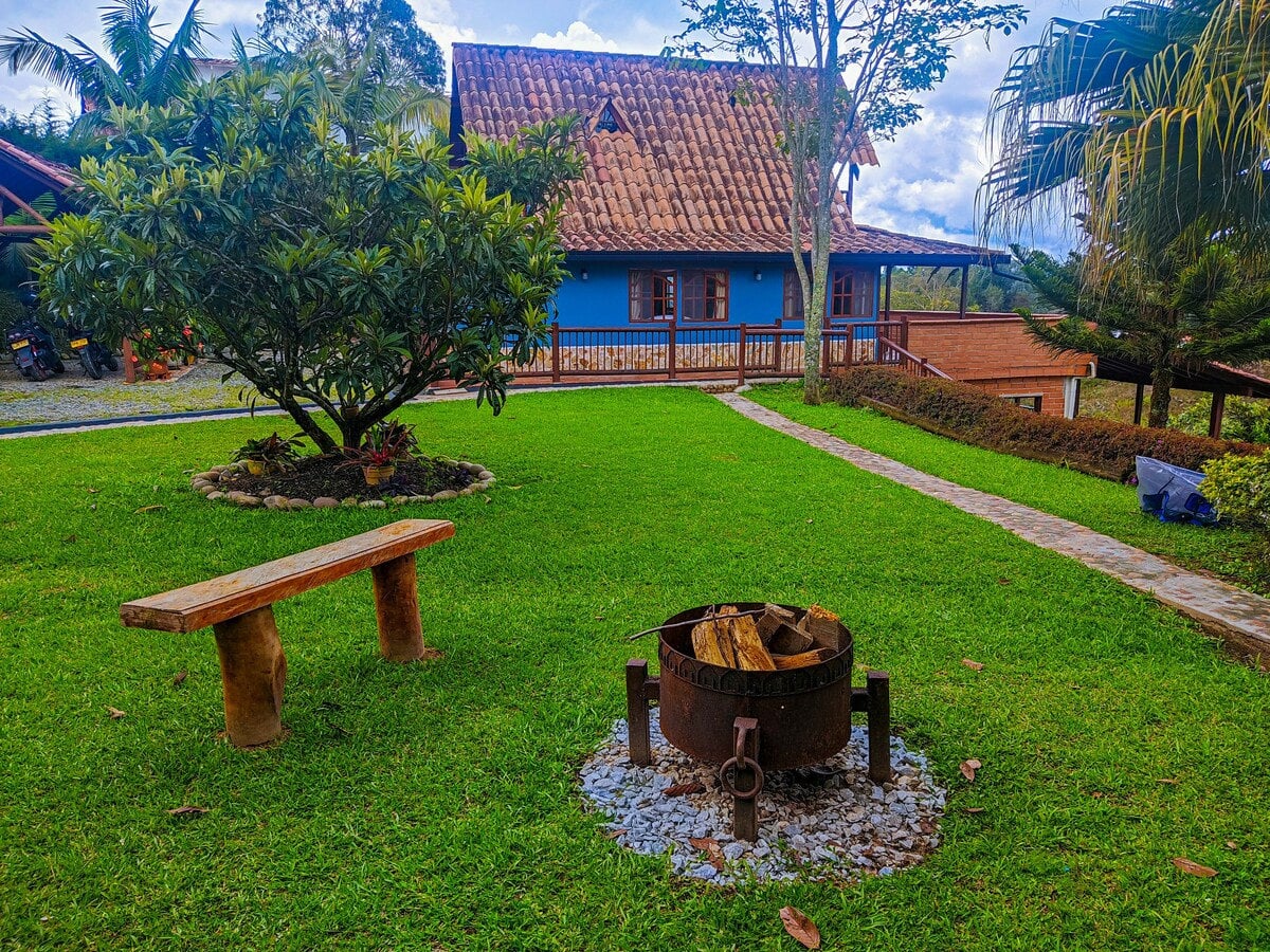 Colorful house with garden and barbecue area
